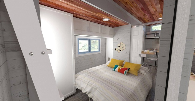 Un lit escamotable pour une vrai chambre Aurora tiny-house extensible © ZeroSquared