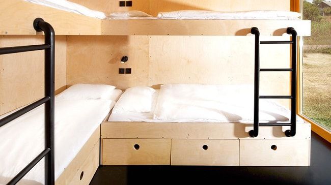 Une chambre avec lits superposés © Artikul Architects